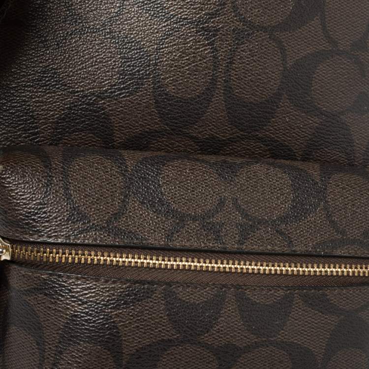 Pre Owned Coach Black/Brown Signature Coated Canvas and Leather Mini Charlie Backpack