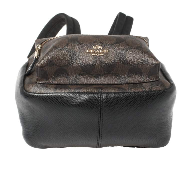 Pre Owned Coach Black/Brown Signature Coated Canvas and Leather Mini Charlie Backpack