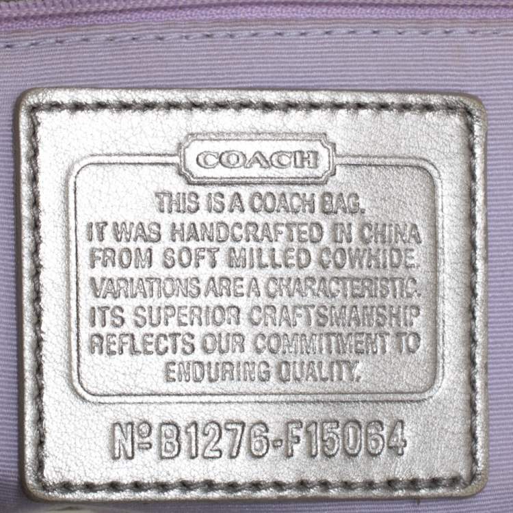 Pre Owned Coach Metallic Silver Leather Duffle Hobo