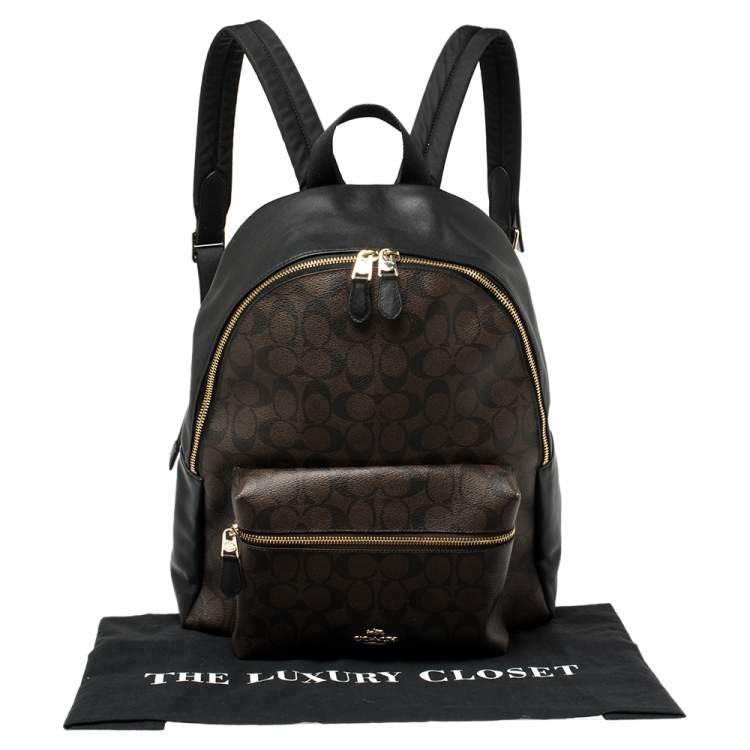 Pre Owned Coach Brown/Black Signature Coated Canvas and Leather Charlie Backpack
