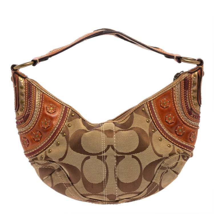 Pre Owned Coach Beige/Brown Signature Canvas and Leather Hobo