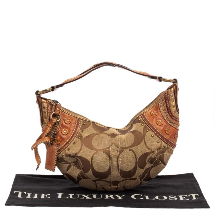 Pre Owned Coach Beige/Brown Signature Canvas and Leather Hobo