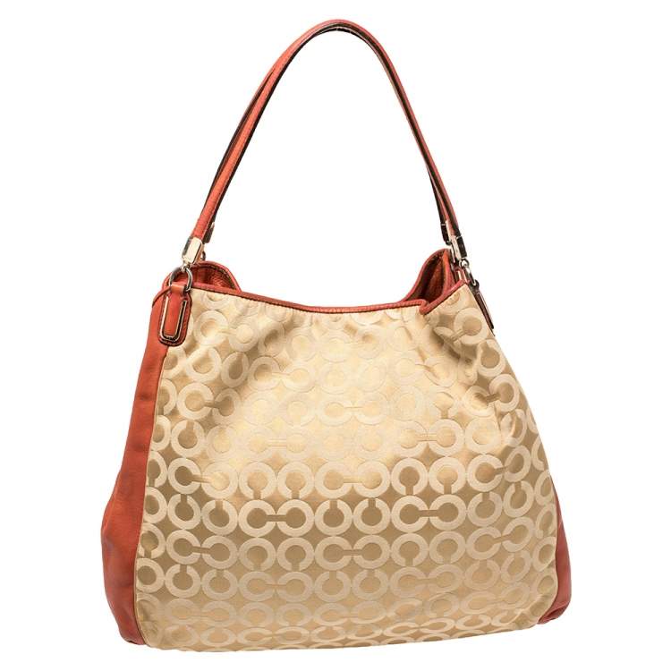 Pre Owned Coach Burnt Orange/Beige Signature Canvas and Leather Edie Shoulder Bag
