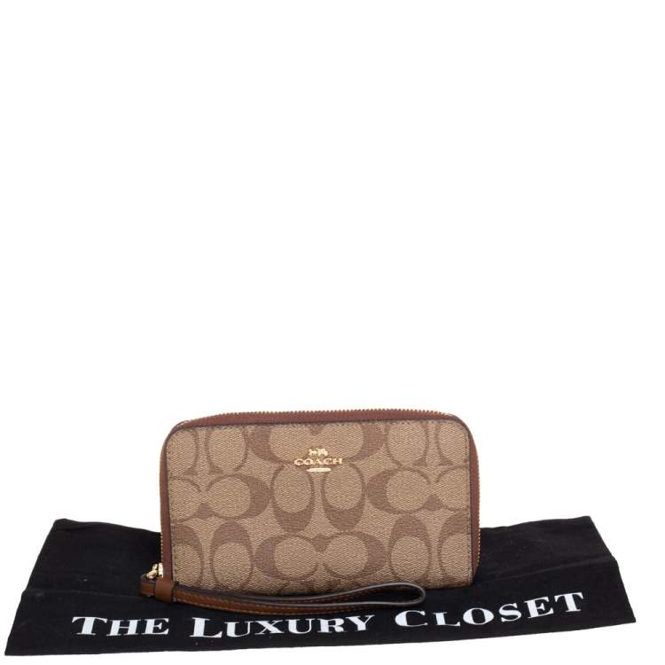 Pre Owned Coach Brown Signature Coated Canvas Wristlet Wallet