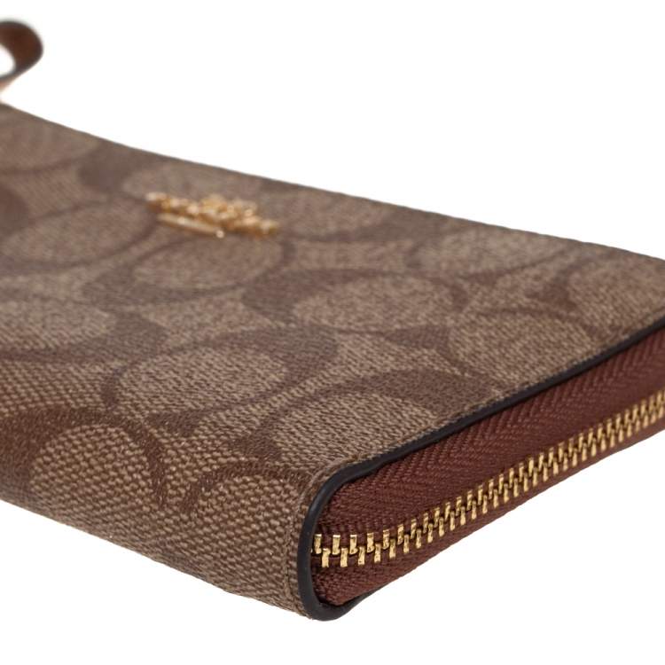 Pre Owned Coach Brown Signature Coated Canvas Wristlet Wallet