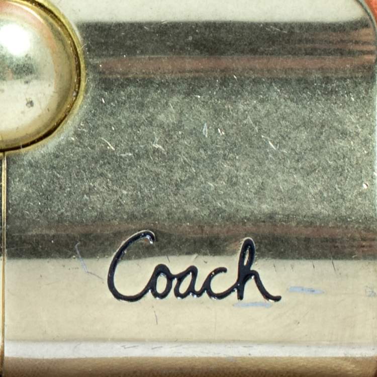 Pre Owned Coach Beige/Orange Signature Canvas and Leather Wristlet Clutch  