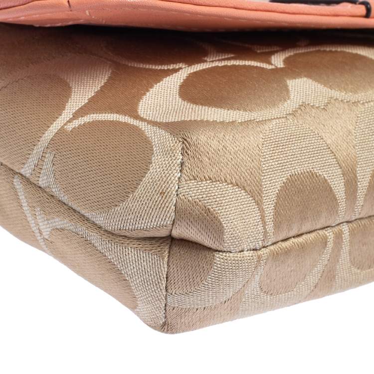 Pre Owned Coach Beige/Orange Signature Canvas and Leather Wristlet Clutch  