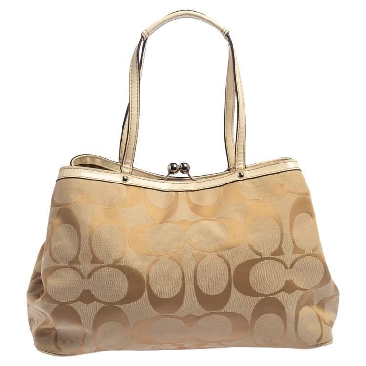 Pre Owned Coach Beige Signature Canvas and Patent Leather Kisslock Framed Carryall Tote