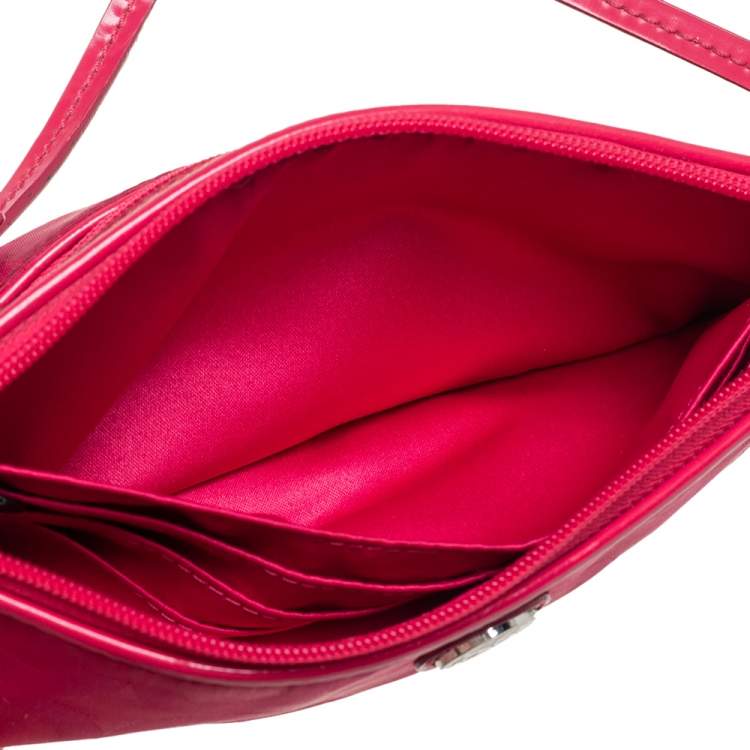 Pre Owned Coach Fuchsia Signature Nylon Wristlet Pochette 