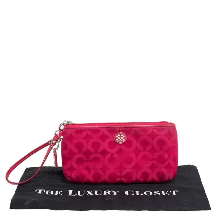 Pre Owned Coach Fuchsia Signature Nylon Wristlet Pochette 