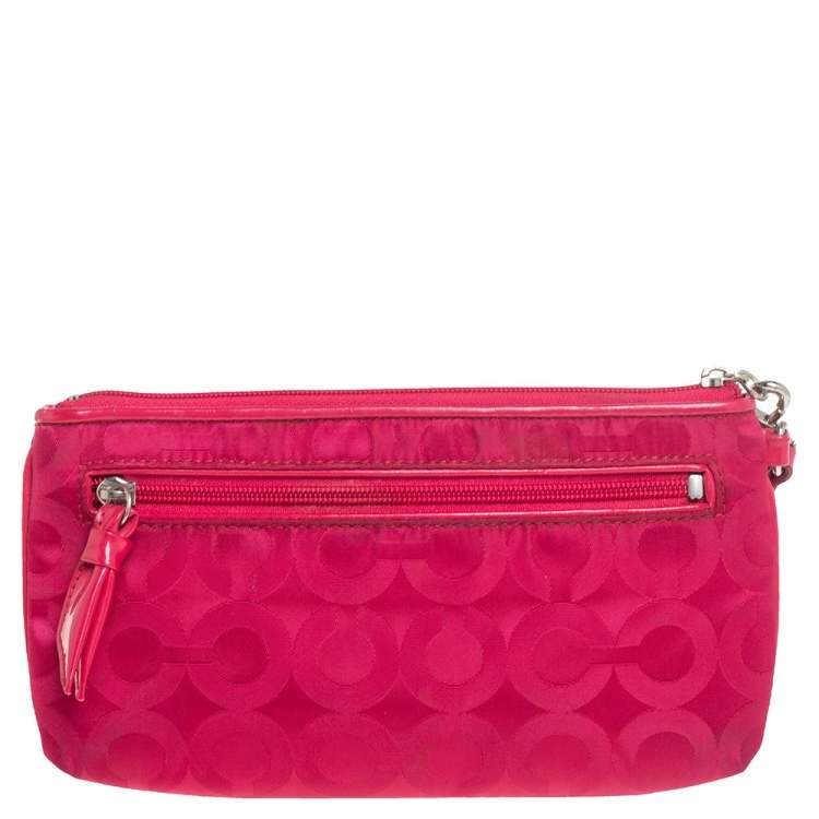 Pre Owned Coach Fuchsia Signature Nylon Wristlet Pochette 