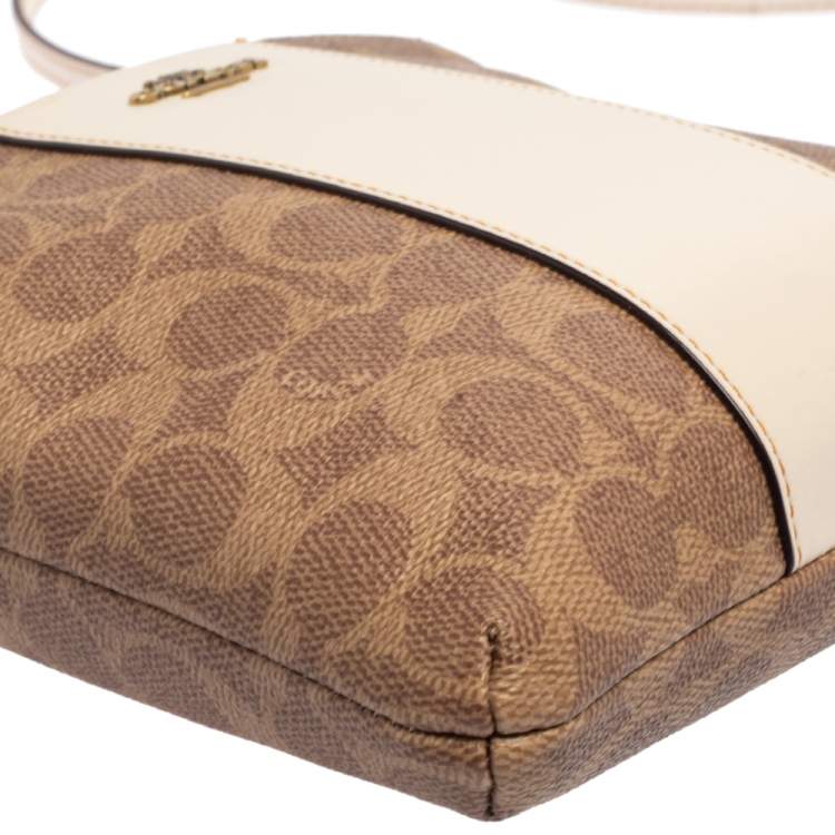 Pre Owned Coach Beige/Pink Signature Coated Canvas and Leather Kitt Messenger Bag