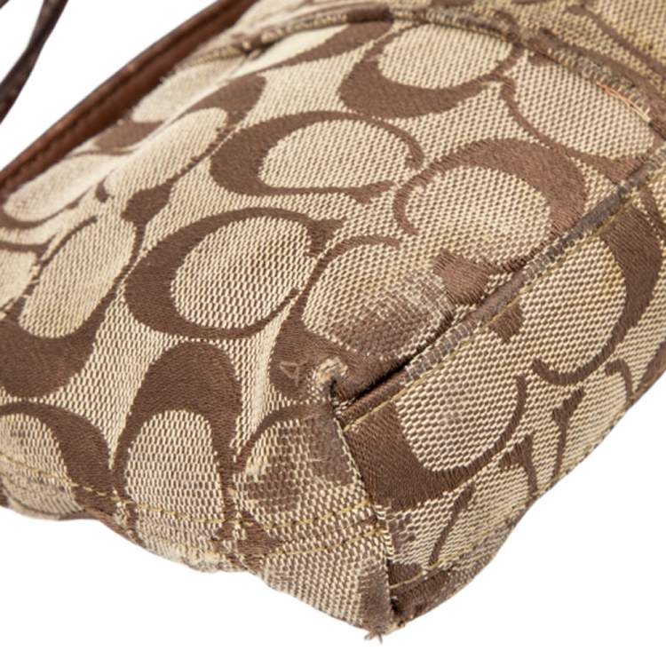 Pre Owned Coach Brown Signature Canvas and Leather Turnlock Wristlet