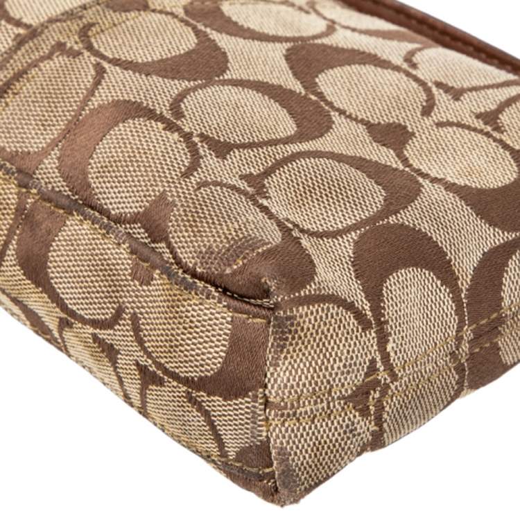 Pre Owned Coach Brown Signature Canvas and Leather Turnlock Wristlet