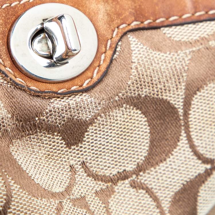 Pre Owned Coach Brown Signature Canvas and Leather Turnlock Wristlet