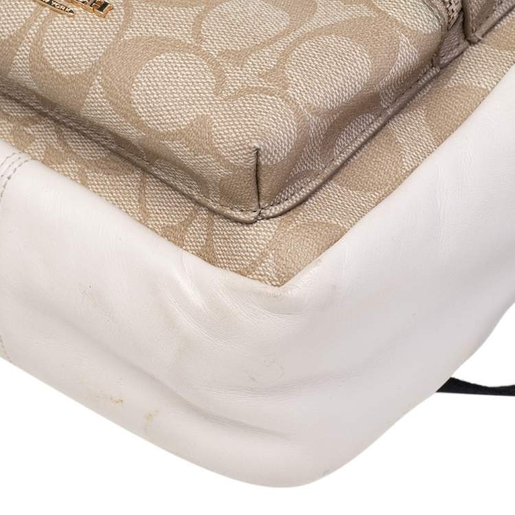 Pre Owned Coach Beige/Cream Signature Coated Canvas And Leather Mini Charlie Backpack