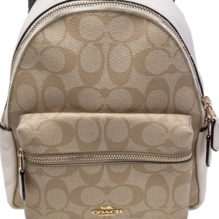 Pre Owned Coach Beige/Cream Signature Coated Canvas And Leather Mini Charlie Backpack
