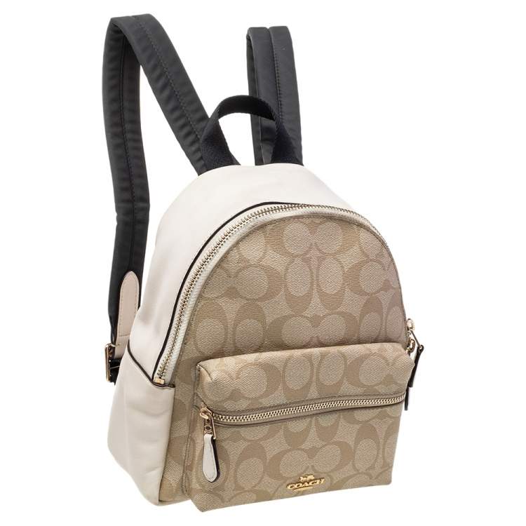 Pre Owned Coach Beige/Cream Signature Coated Canvas And Leather Mini Charlie Backpack