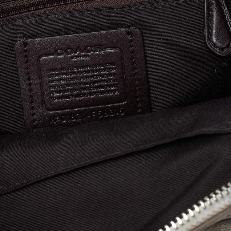 Pre Owned Coach Beige/Cream Signature Coated Canvas And Leather Mini Charlie Backpack