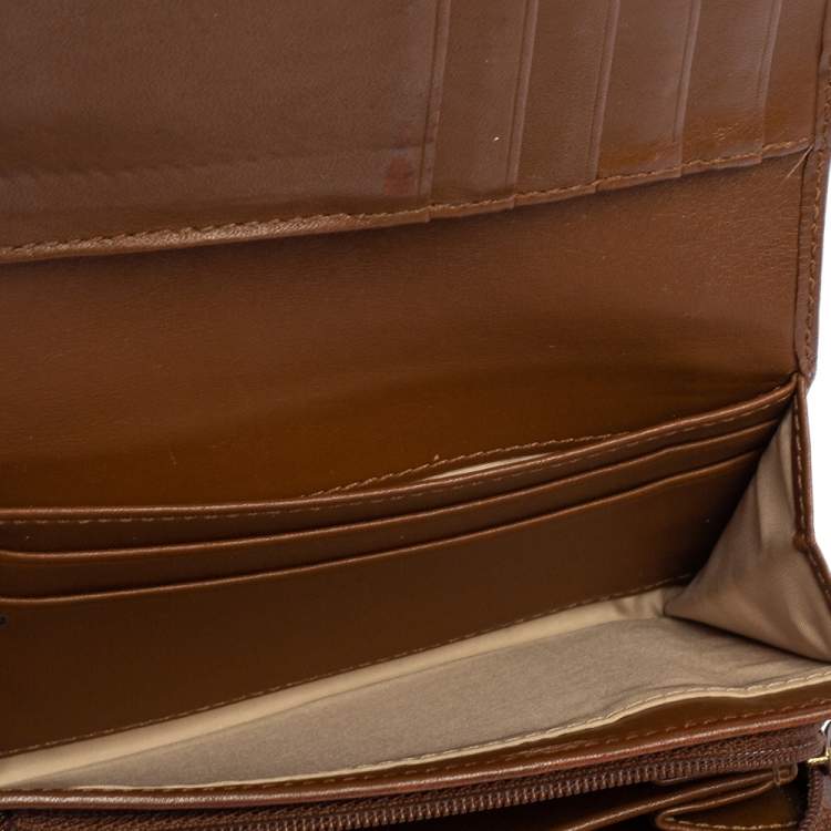 Pre Owned Coach Beige/Brown Signature Canvas and Leather Compact Wallet