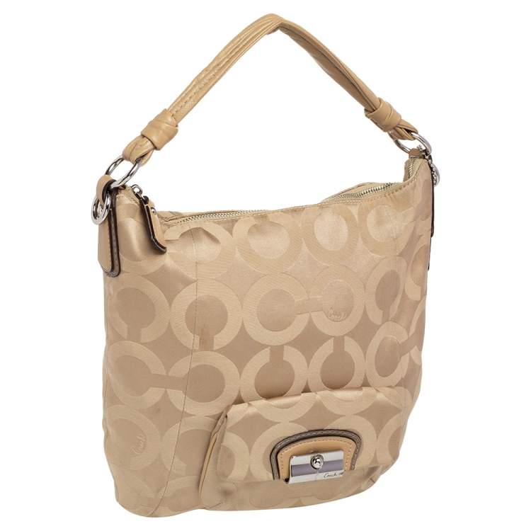 Pre Owned Coach Beige Signature Canvas And Leather Hobo
