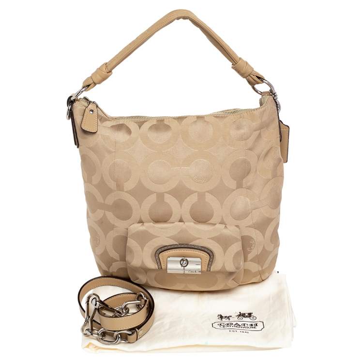 Pre Owned Coach Beige Signature Canvas And Leather Hobo