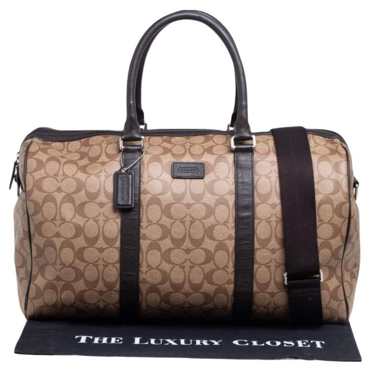 Pre Owned Coach Brown/Beige Signature Coated Canvas and Leather Metropolitan Duffle Bag