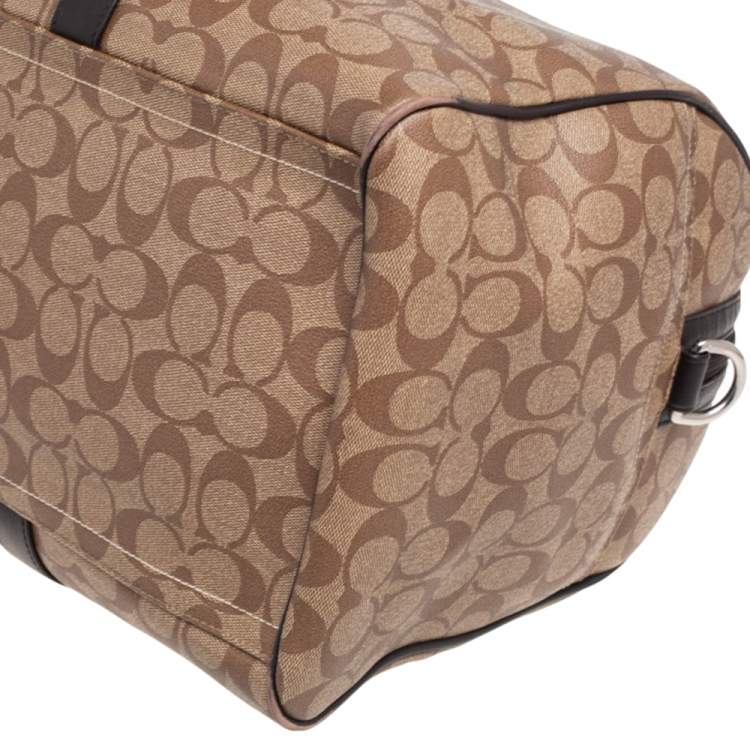 Pre Owned Coach Brown/Beige Signature Coated Canvas and Leather Metropolitan Duffle Bag