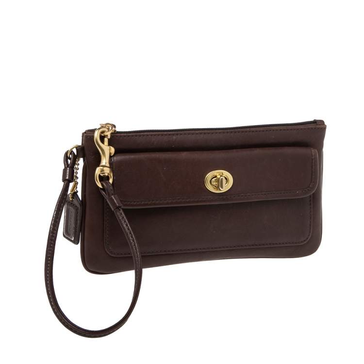 Pre Owned Coach Dark Brown Leather Turnlock Wristlet Pouch