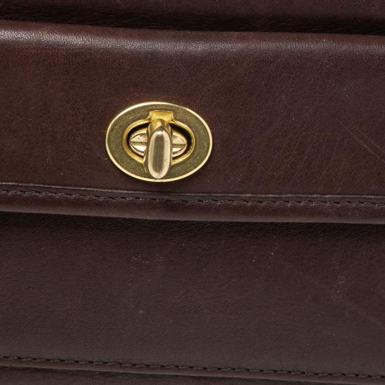Pre Owned Coach Dark Brown Leather Turnlock Wristlet Pouch