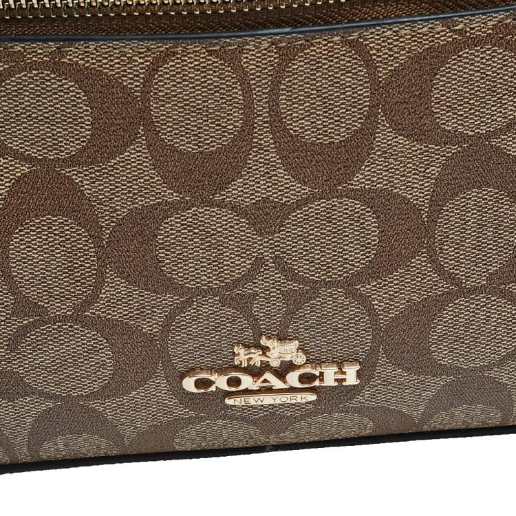 Pre Owned Coach Brown/White Signature Coated Canvas and Leather Jordyn Backpack