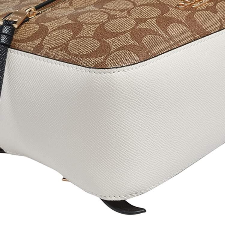 Pre Owned Coach Brown/White Signature Coated Canvas and Leather Jordyn Backpack