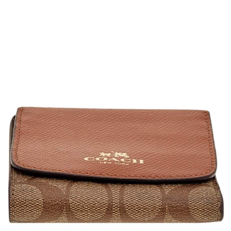 Pre Owned Coach Brown Signature Coated Canvas and Leather Trifold Wallet