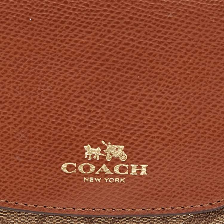 Pre Owned Coach Brown Signature Coated Canvas and Leather Trifold Wallet