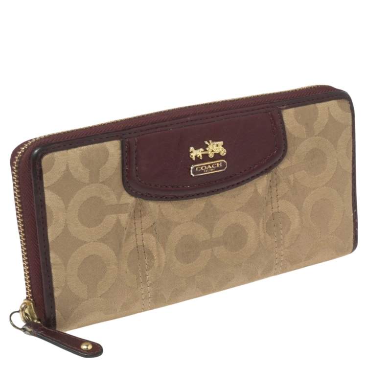 Pre Owned Coach Burgundy/Brown Op Art Fabric and Leather Madison Continental Wallet