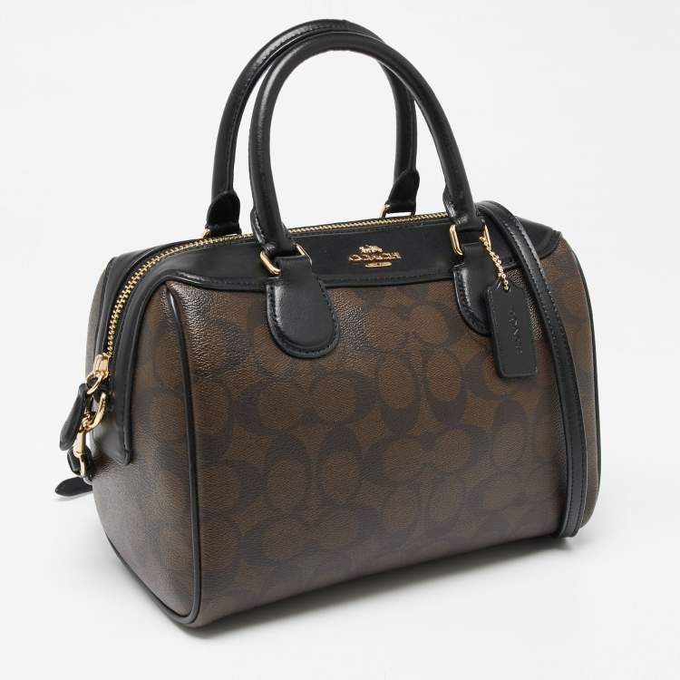 Pre Owned Coach Black/Brown Signature Coated Canvas And Leather Boston Bag