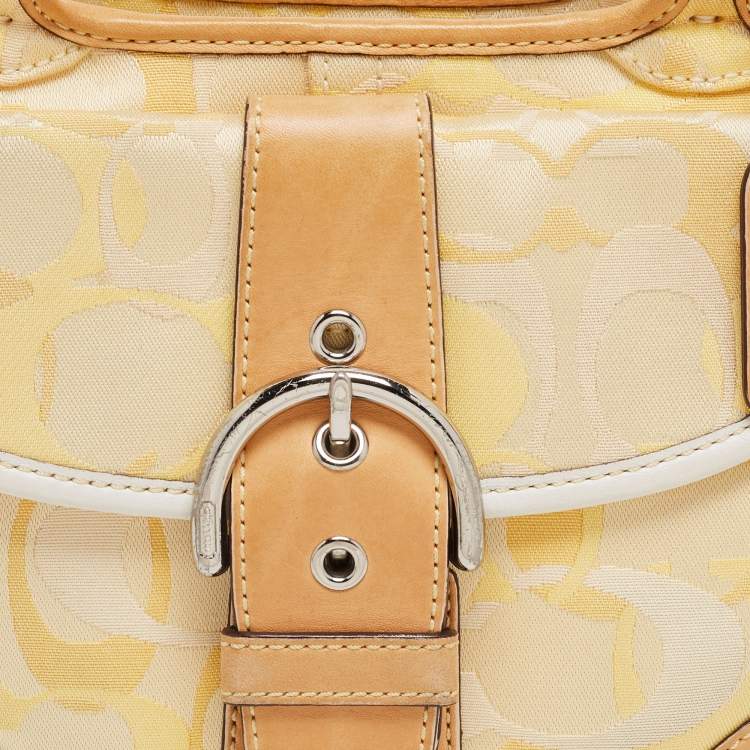 Pre Owned Coach Yellow/White Signature Fabric and Leather Soho Optic Hobo