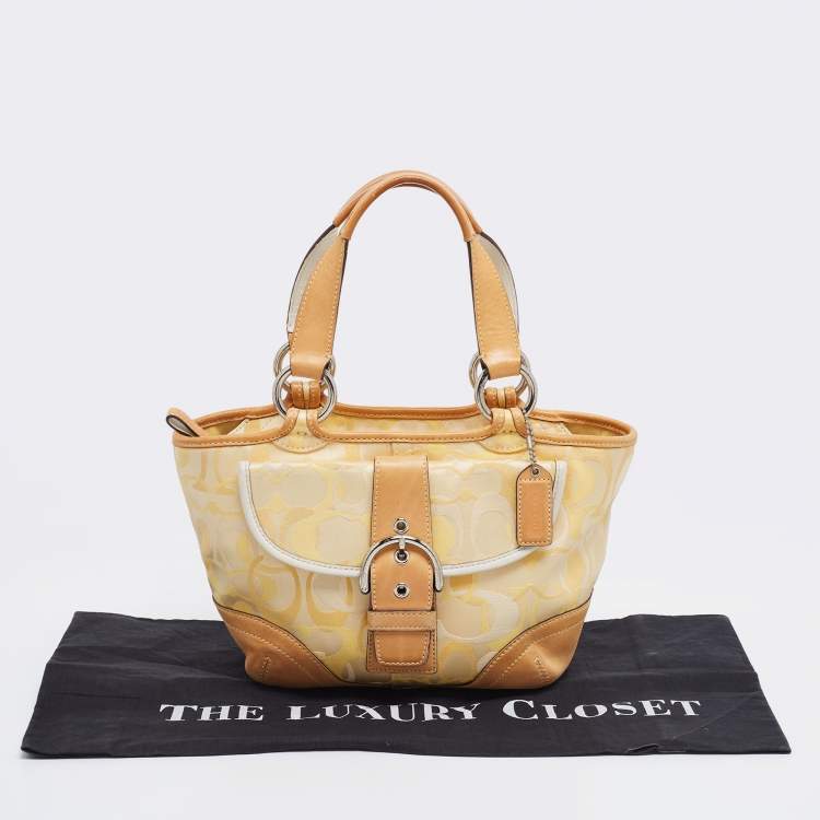 Pre Owned Coach Yellow/White Signature Fabric and Leather Soho Optic Hobo