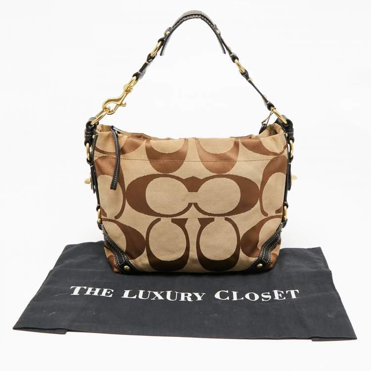 Pre Owned Coach Beige/Dark Brown Signature Canvas and Leather Carly Hobo