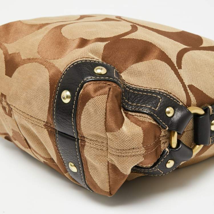 Pre Owned Coach Beige/Dark Brown Signature Canvas and Leather Carly Hobo