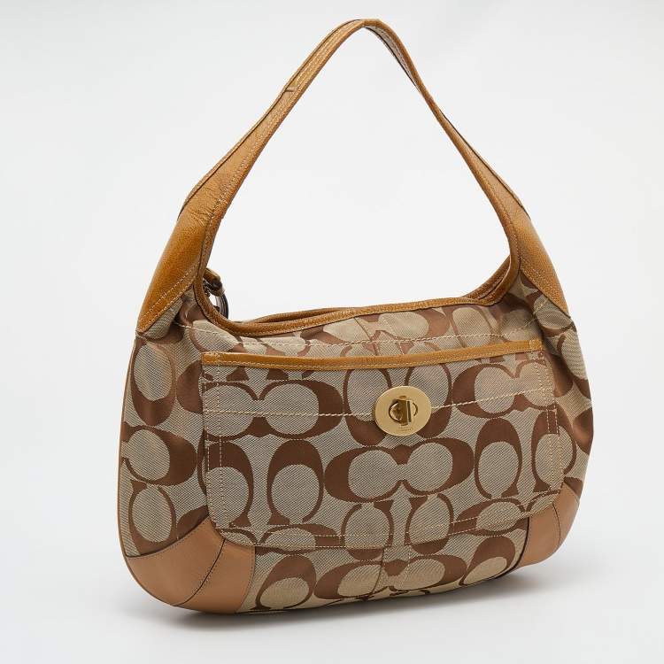Pre Owned Coach Beige/Brown Signature Canvas And Leather Hobo