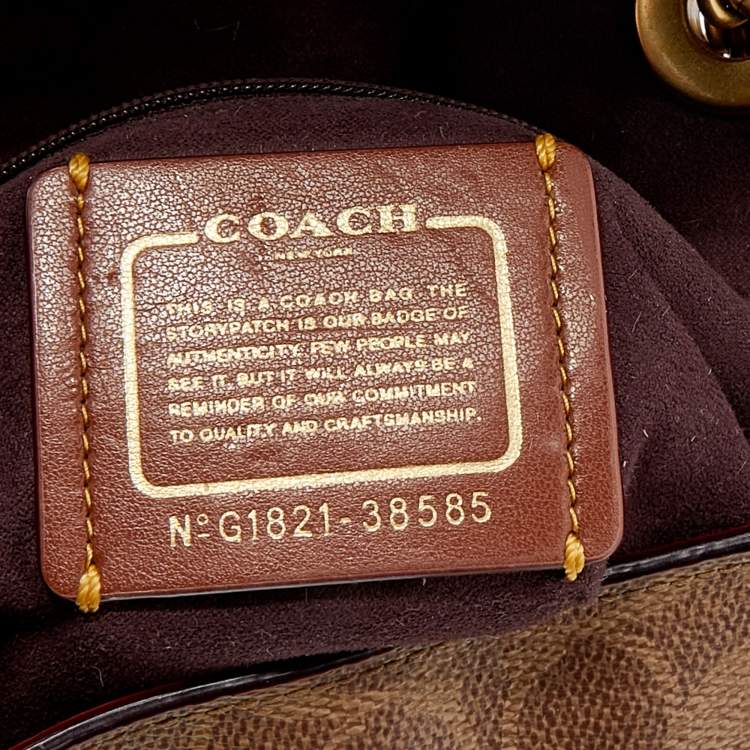 Pre Owned Coach Beige/Brown Signature Coated Canvas and Leather Parker Backpack 