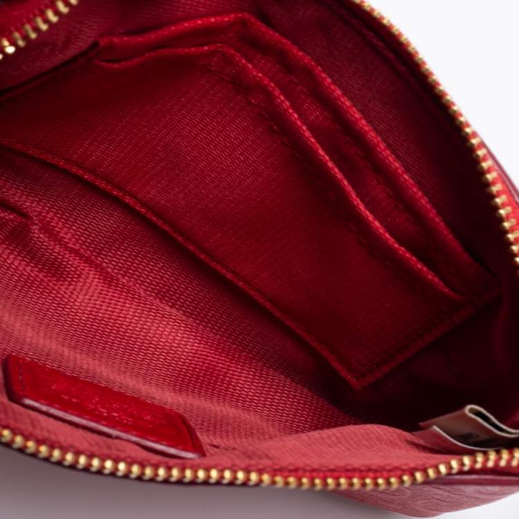 Pre Owned Coach Red Signature Embossed Leather Wristlet Clutch