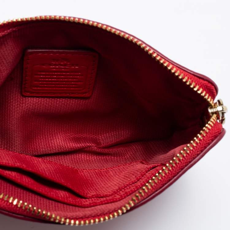 Pre Owned Coach Red Signature Embossed Leather Wristlet Clutch