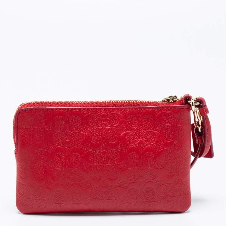 Pre Owned Coach Red Signature Embossed Leather Wristlet Clutch