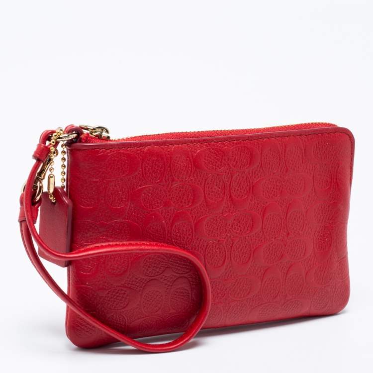 Pre Owned Coach Red Signature Embossed Leather Wristlet Clutch