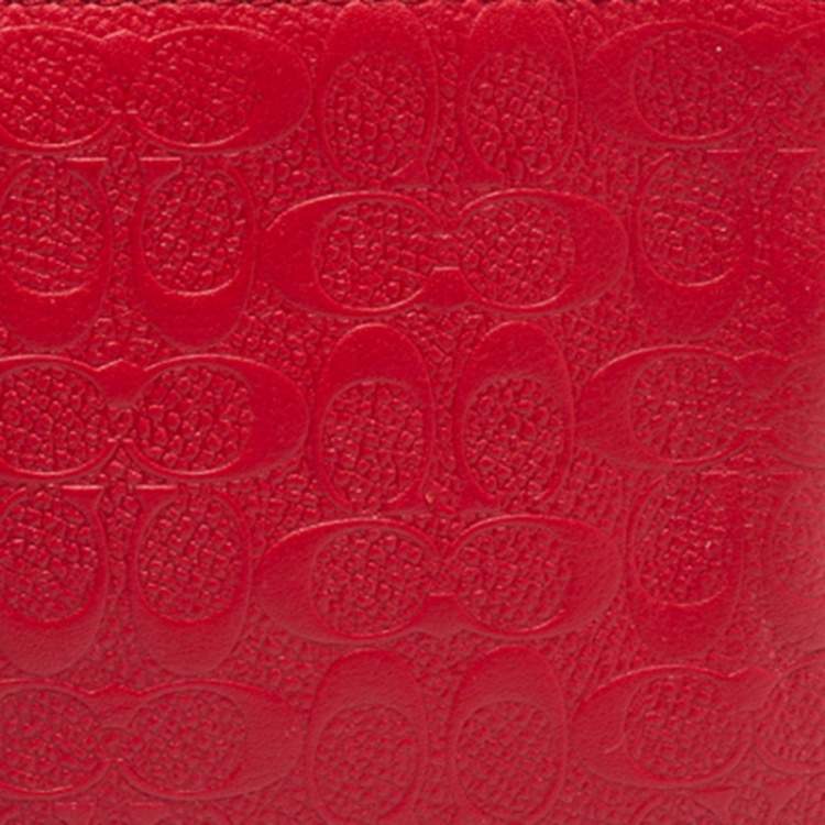 Pre Owned Coach Red Signature Embossed Leather Wristlet Clutch