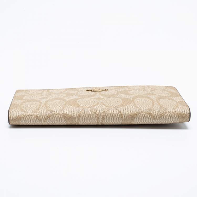 Pre Owned Coach Beige Signature Coated Canvas Long Slim Bifold Wallet