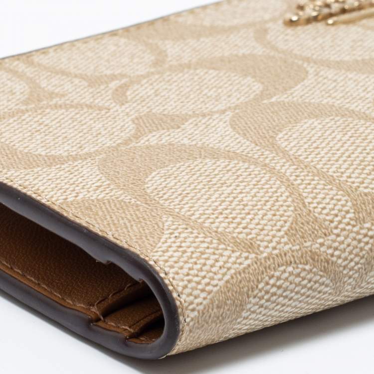 Pre Owned Coach Beige Signature Coated Canvas Long Slim Bifold Wallet