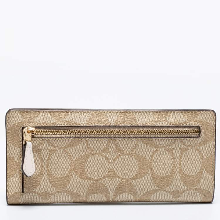Pre Owned Coach Beige Signature Coated Canvas Long Slim Bifold Wallet